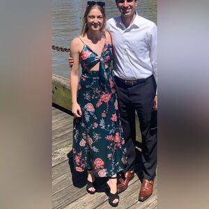 Blue dress with pink and red floral design.